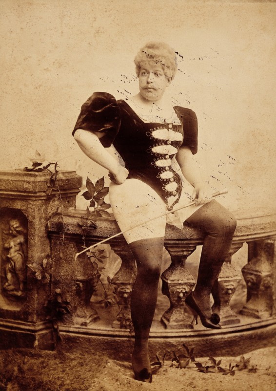 L0031641 Photograph of a man dressed in women's clothing