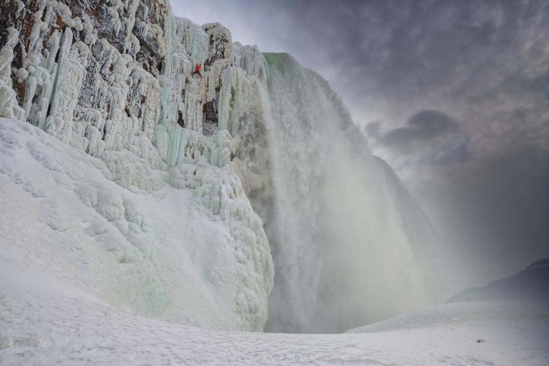 Will Gadd ice climbing on frozen Niagra Falls and about to make history during the first ascent ever of the worlds most famous waterfall