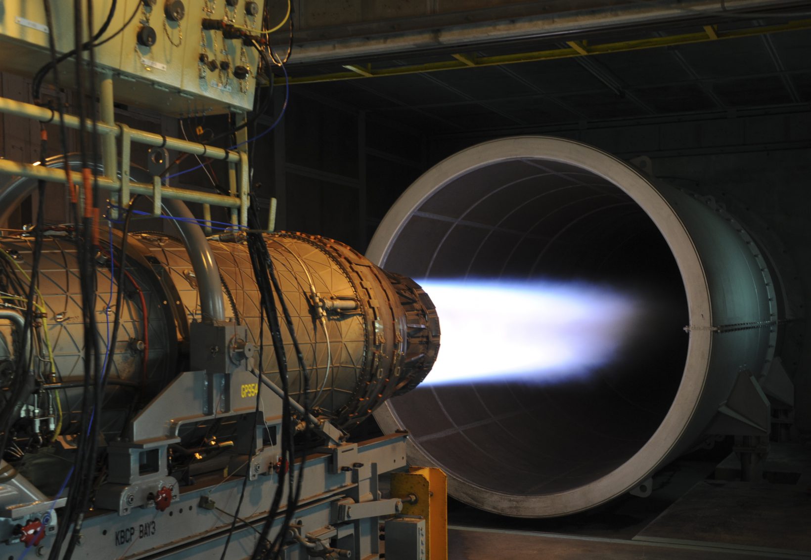 A U.S. Air Force F-15 Eagle fighter jet engine is pushed to maximum speed during a routine engine test at the 18th Component Maintenance Squadron on Kadena Air Base, Japan, June 26, 2012. 18th CMS engine test facility is primarily used for testing uninstalled engines following maintenance, and is also used as a trim pad to perform tests on highly powered aircrafts that run above 80 percent of the engines rated capacity. (U.S. Air Force photo/Airman 1st Class Justin Veazie)