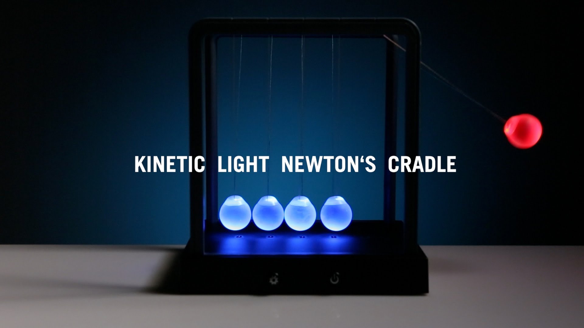 Un pendule de Newton lumineux