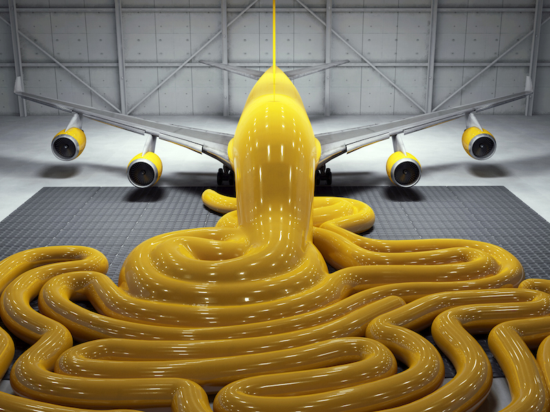 Un avion et une substance jaune